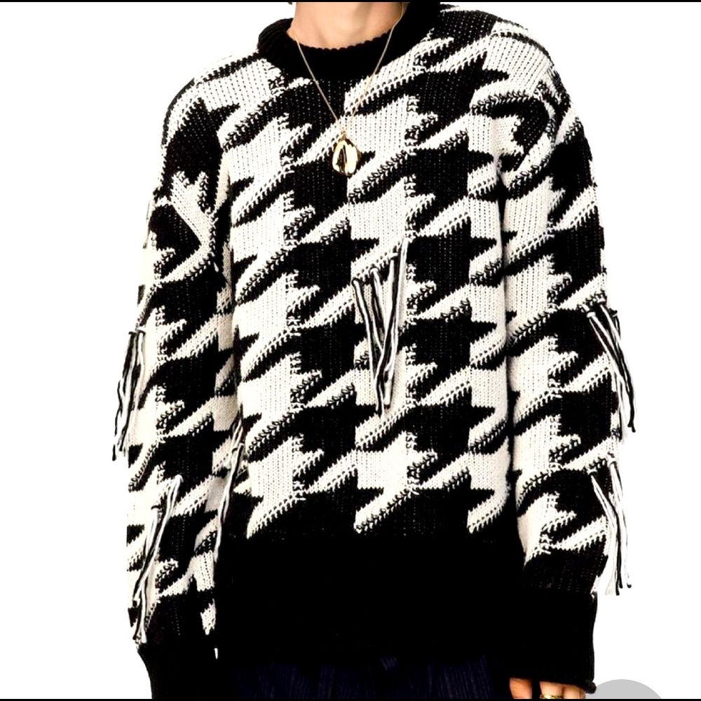 Limited edition fringed jacquard sweater.